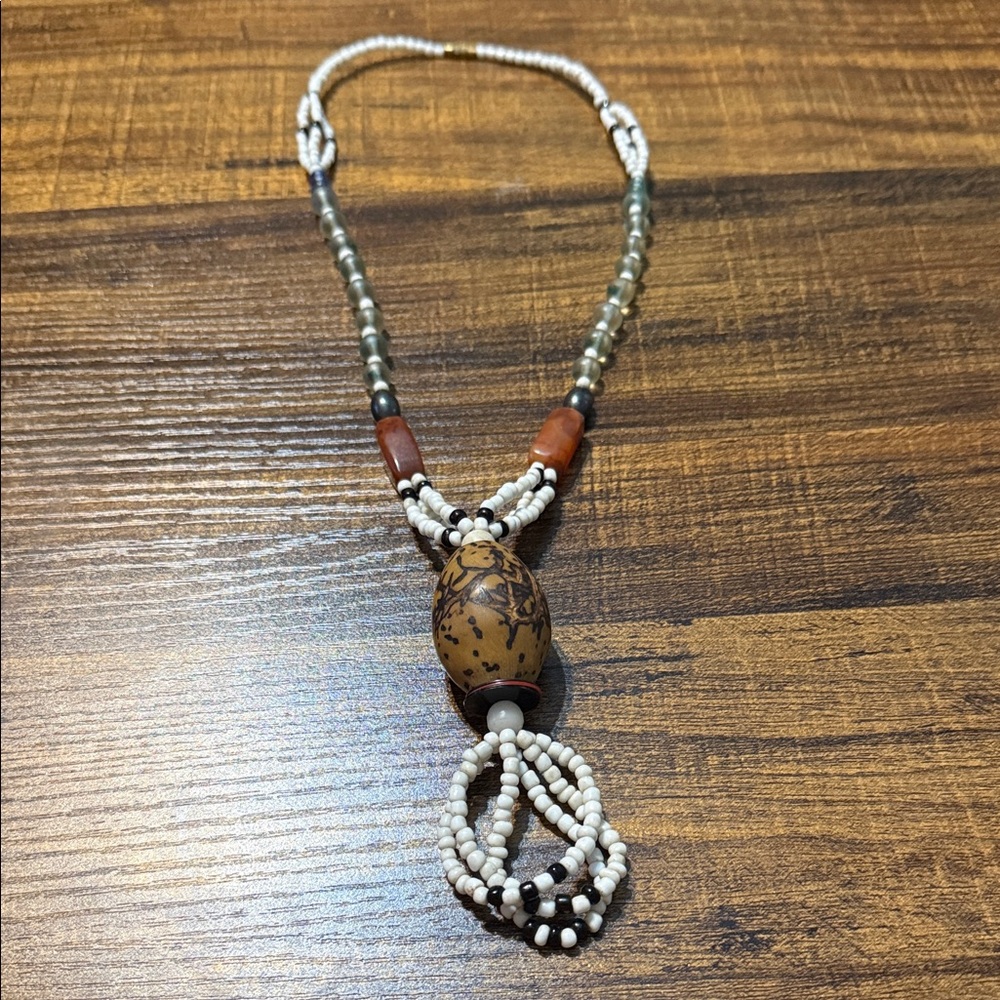 Elegant Beaded Necklace with Brown and White Accents